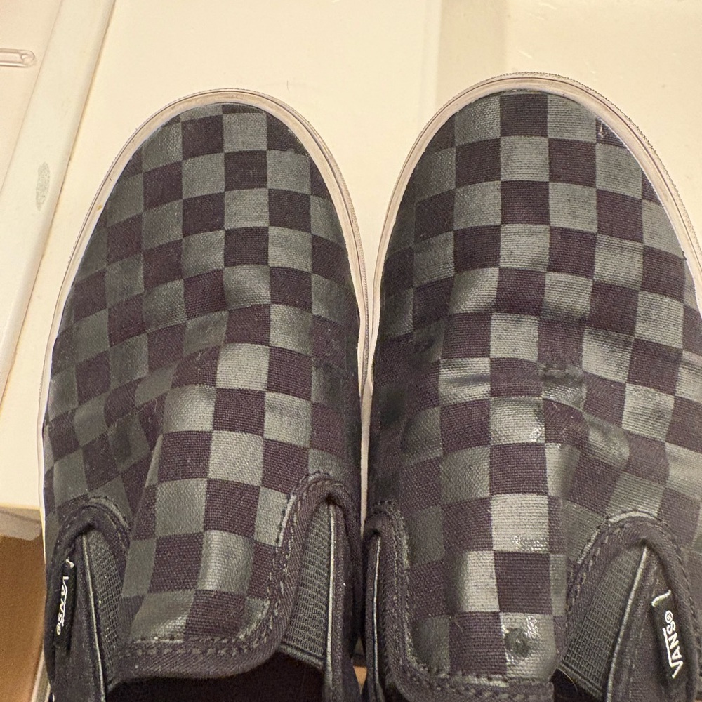 Vans women's Black and Gray Checkered Slip-On Shoes
